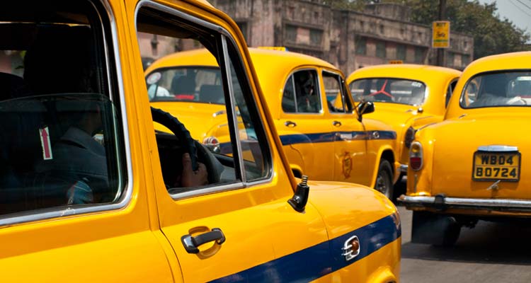 The classical ambassador cab is the unique style of taxi service that imported from British civilization in Kolkata, India.