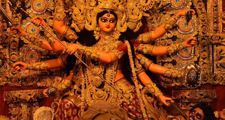 Idol of Goddess Durga killing Mahishasura. Photo by Tanuj Adhikary on Unsplash